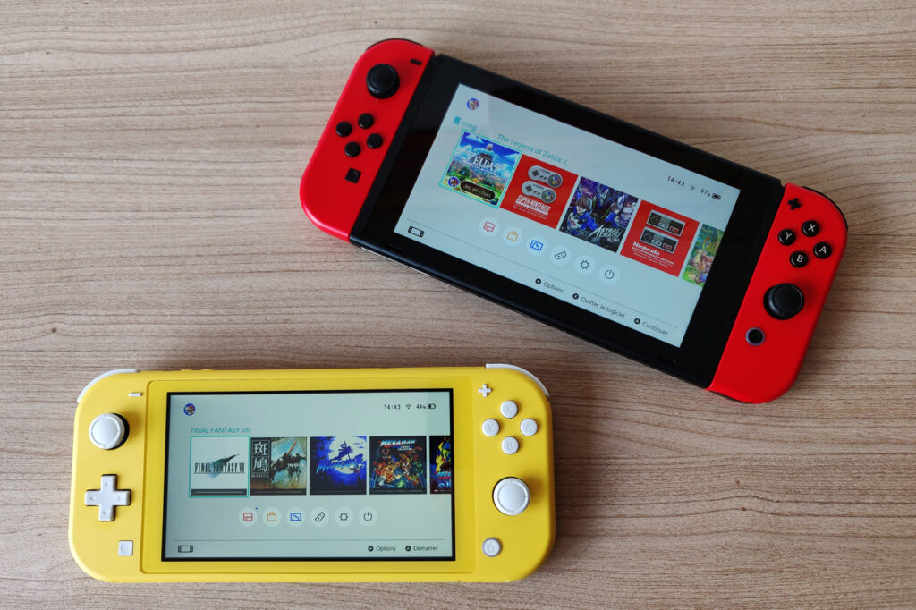 Nintendo switch lite flaché puce pleine de jeux + carte mémoire